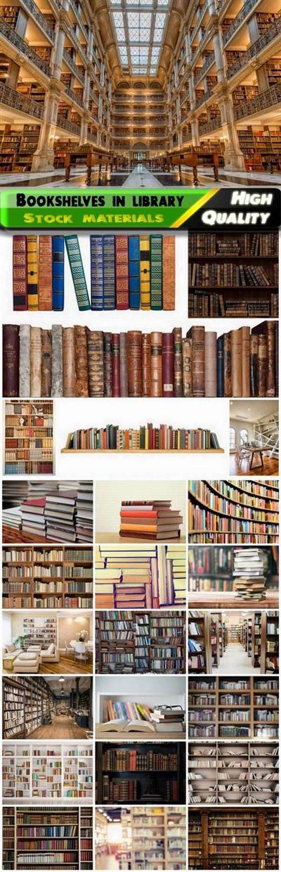 Bookshelves in library with new and old books Stock images